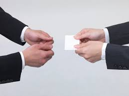 Should be given to the recipient with both hand. The front of the card should be facing the recipient.