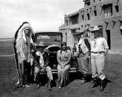 • Humor is used to satirize the way in which Indigenous history is often appropriated and distorted by non-Indigenous people.