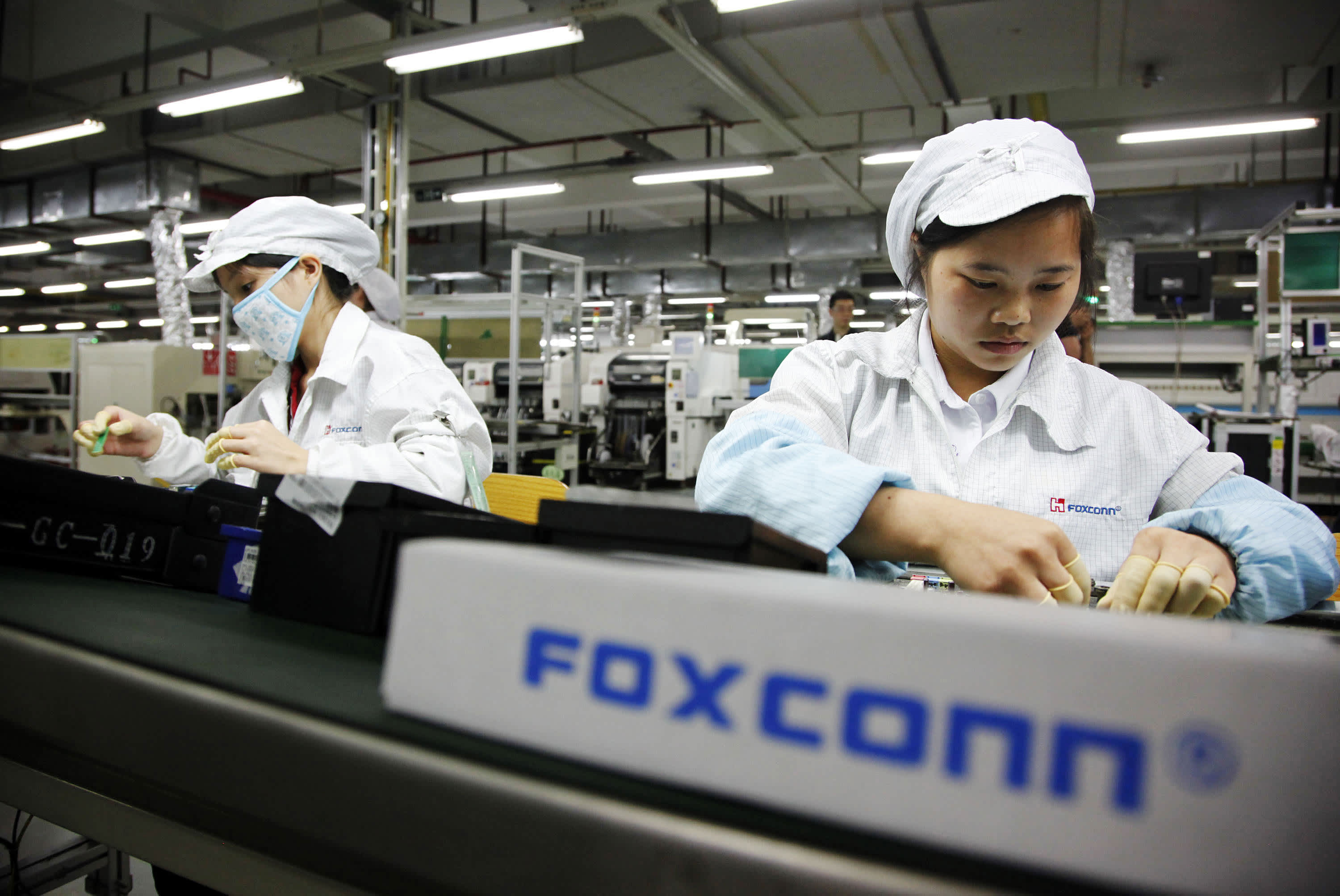 Image: One million workers in China work to create iphones. Paid very low wages with 17 suicides last year.