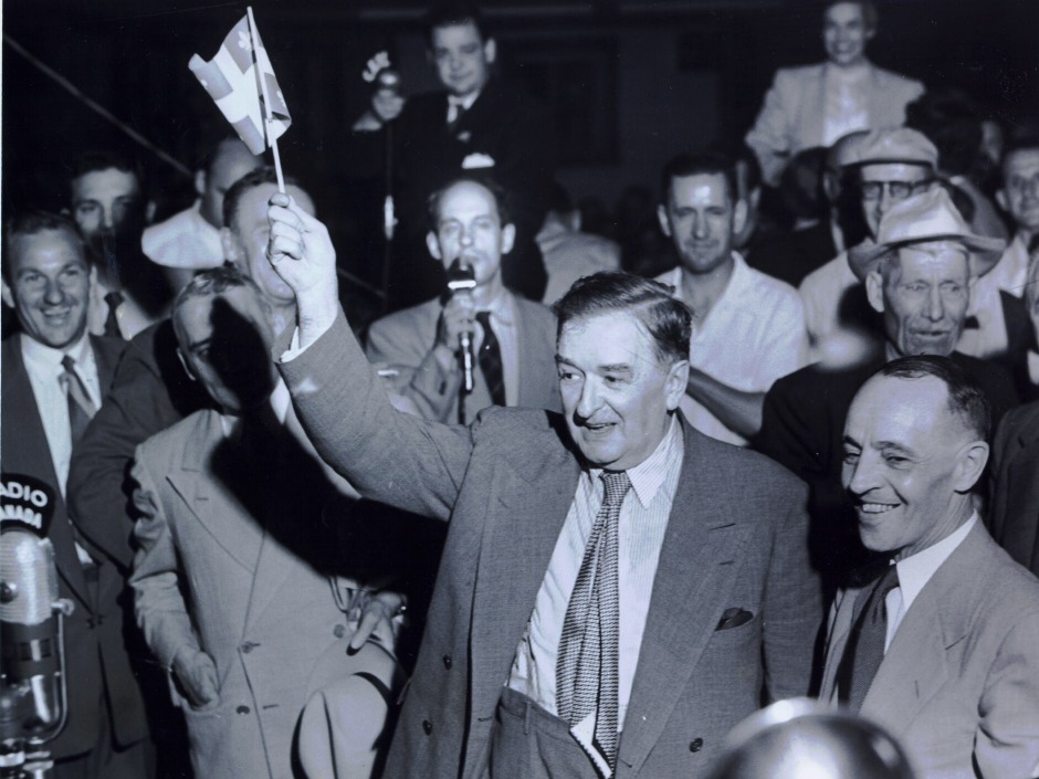 Potential Artifact (Visual):
A photograph of Maurice Duplessis during his time as
Premier of Quebec while waving a Quebec fla