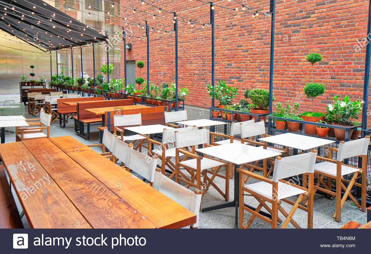 It can consist of patio chairs and tables in a circle