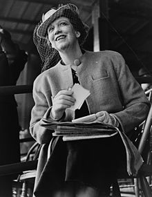 Clothes were rationed and fabric was scarcer, the hem lines of dresses rose to knee length