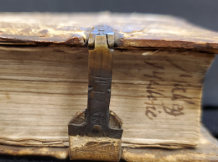 Had a lock on the side 
opposite of the spine.